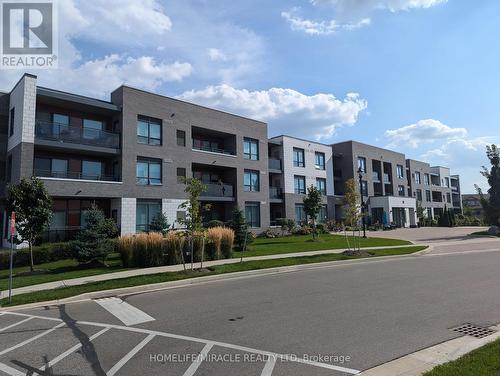 106 - 30 Via Rosedale Drive, Brampton (Sandringham-Wellington), ON - Outdoor With Balcony With Facade