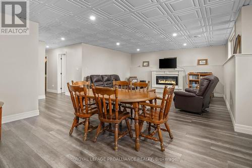 2263 Victoria Road, Prince Edward County (Ameliasburgh), ON - Indoor Photo Showing Dining Room With Fireplace