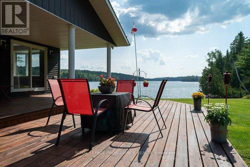 1049 Perry Lane, North Frontenac, ON - Outdoor With Body Of Water With Deck Patio Veranda With Exterior