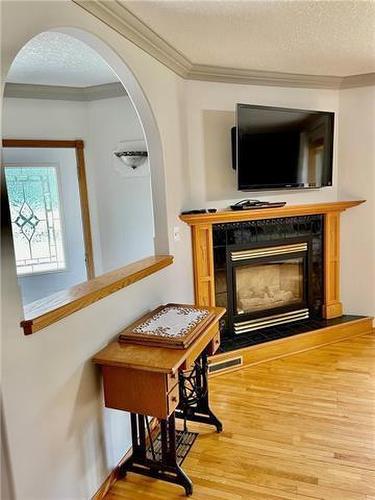 710 Thomas Drive, Virden, MB - Indoor With Fireplace