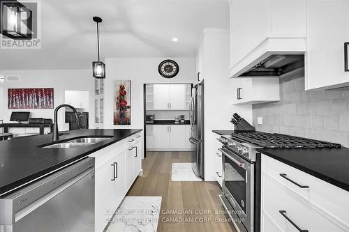 1543 Moe Norman Place, London, ON - Indoor Photo Showing Kitchen With Stainless Steel Kitchen With Double Sink With Upgraded Kitchen