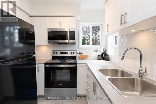 B8 - 240 Ormond Drive, Oshawa (Samac), ON - Indoor Photo Showing Kitchen With Double Sink