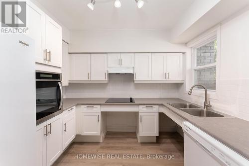 D10 - 240 Ormond Drive, Oshawa, ON - Indoor Photo Showing Kitchen With Double Sink