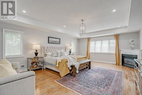 2 - 128 Morden Road, Oakville (Bronte East), ON - Indoor Photo Showing Bedroom With Fireplace