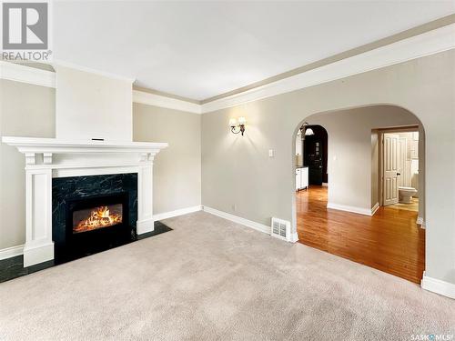 323 14Th Street W, Prince Albert, SK - Indoor Photo Showing Living Room With Fireplace