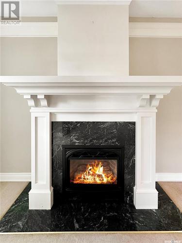 323 14Th Street W, Prince Albert, SK - Indoor Photo Showing Living Room With Fireplace