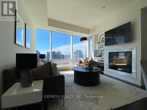 4202 - 180 University Avenue, Toronto, ON - Indoor Photo Showing Living Room With Fireplace