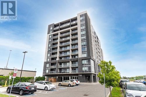 911 - 716 Main Street E, Milton (Old Milton), ON - Outdoor With Balcony With Facade