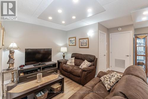 911 - 716 Main Street E, Milton (Old Milton), ON - Indoor Photo Showing Living Room