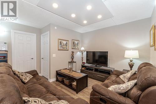 911 - 716 Main Street E, Milton (Old Milton), ON - Indoor Photo Showing Living Room