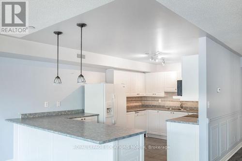 205 - 4 Beck Boulevard, Penetanguishene, ON - Indoor Photo Showing Kitchen With Double Sink