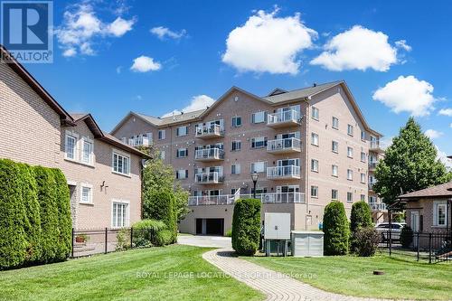 205 - 4 Beck Boulevard, Penetanguishene, ON - Outdoor With Balcony With Facade