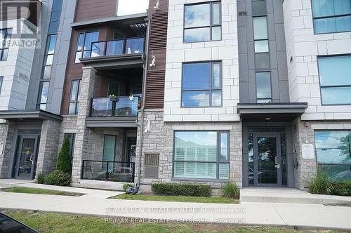 305 - 2388 Khalsa Gate, Oakville, ON - Outdoor With Facade