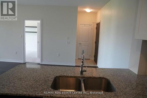 305 - 2388 Khalsa Gate, Oakville, ON - Indoor Photo Showing Kitchen With Double Sink