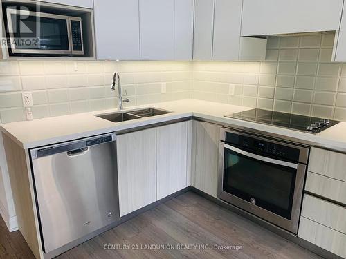 605 - 15 Water Walk Drive, Markham (Unionville), ON - Indoor Photo Showing Kitchen With Stainless Steel Kitchen With Double Sink With Upgraded Kitchen