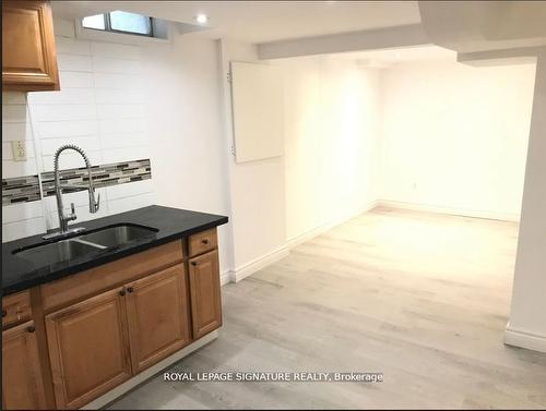 Lower-74 Deanscroft Sq, Toronto, ON - Indoor Photo Showing Kitchen With Double Sink