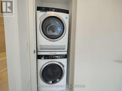 2908 - 55 Cooper Street S, Toronto, ON - Indoor Photo Showing Laundry Room
