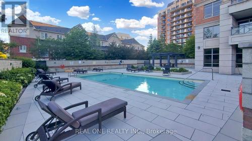 1109 - 2391 Central Park Drive, Oakville, ON - Outdoor With In Ground Pool