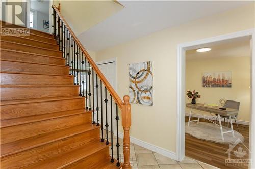 Elegant hardwood staircase leading to the second level - 2130 Fillmore Crescent, Ottawa, ON - Indoor Photo Showing Other Room