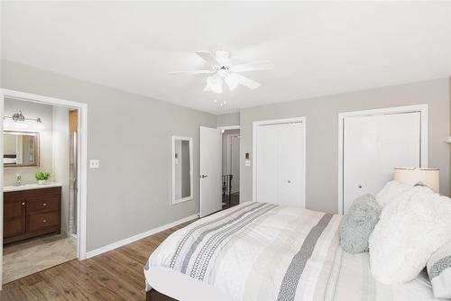 Primary bed with double closet and 3pc. updated ensuite - 64 Terrace Drive, Dundas, ON - Indoor Photo Showing Bedroom