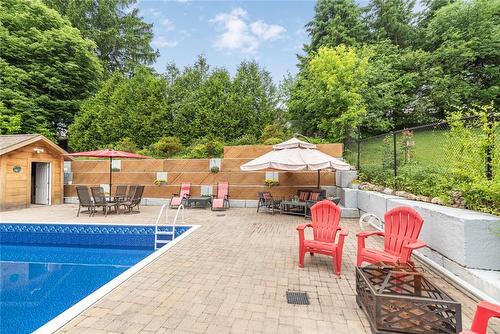 Plenty of seating areas for the entertainers! - 64 Terrace Drive, Dundas, ON - Outdoor With In Ground Pool With Deck Patio Veranda With Backyard