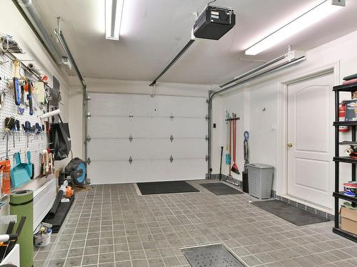 Garage - 22 Av. Godfrey, Saint-Sauveur, QC - Indoor Photo Showing Garage