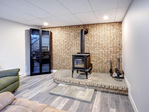 Family room - 15 Route De Rawdon, Saint-Alphonse-Rodriguez, QC - Indoor With Fireplace