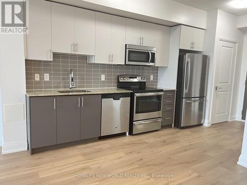 628 - 7161 Yonge Street, Markham, ON - Indoor Photo Showing Kitchen With Upgraded Kitchen