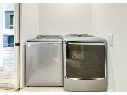 Powder room - 164 Rue Grandmaison, Mont-Blanc, QC - Indoor Photo Showing Laundry Room