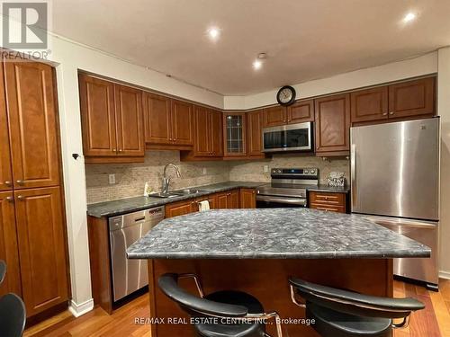 105 - 5530 Glen Erin Drive, Mississauga, ON - Indoor Photo Showing Kitchen With Double Sink