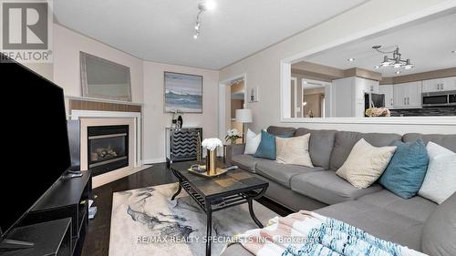 234 Waterbury Street, Caledon, ON - Indoor Photo Showing Living Room With Fireplace