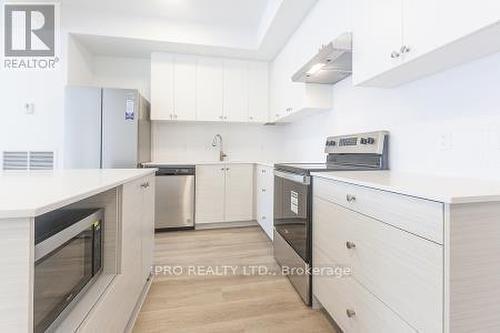 303 - 19B West Street N, Kawartha Lakes, ON - Indoor Photo Showing Kitchen With Stainless Steel Kitchen With Upgraded Kitchen