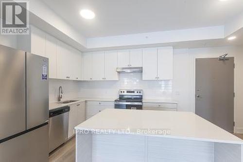 303 - 19B West Drive, Kawartha Lakes, ON - Indoor Photo Showing Kitchen With Stainless Steel Kitchen