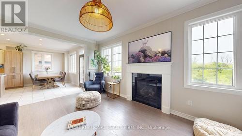 55 Barchard Street, Clarington, ON - Indoor Photo Showing Living Room With Fireplace