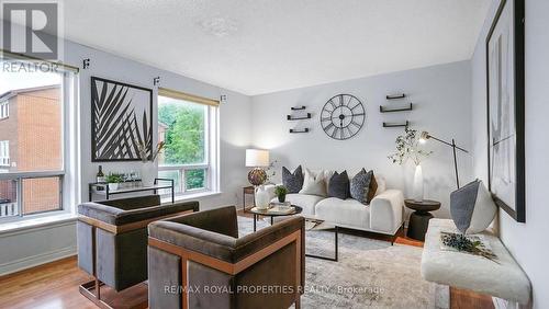 207 - 6442 Finch Avenue W, Toronto, ON - Indoor Photo Showing Living Room