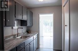 Walk in pantry w sink and laundry area(hook up ready) - 