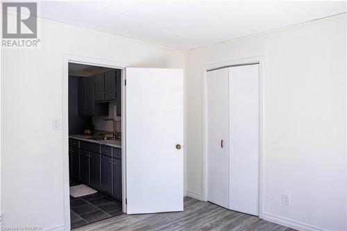 Bedroom/office off the pantry/laundry with sliding doors to deck - 291 Huron Road, Red Bay, ON - Indoor Photo Showing Other Room