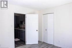 Bedroom/office off the pantry/laundry with sliding doors to deck - 