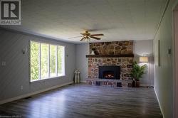 Large living room propane fireplace and updated flooring - 