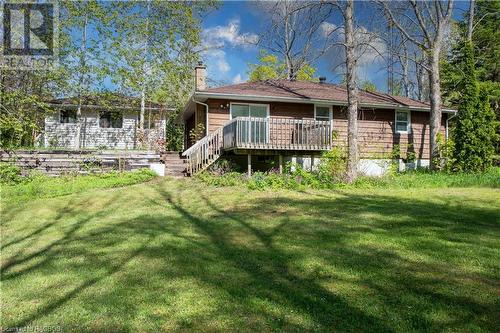 Rear yard w small deck off back to enjoy the sounds of nature - 291 Huron Road, Red Bay, ON - Outdoor With Deck Patio Veranda