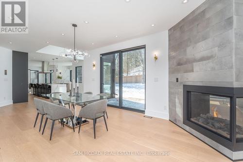 1500 Marshwood Place, Mississauga, ON - Indoor Photo Showing Dining Room With Fireplace