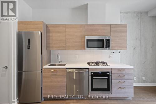 610 - 11 Charlotte Street, Toronto, ON - Indoor Photo Showing Kitchen With Upgraded Kitchen