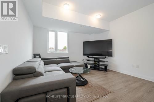 103 - 56 Coles Avenue, Vaughan, ON - Indoor Photo Showing Living Room