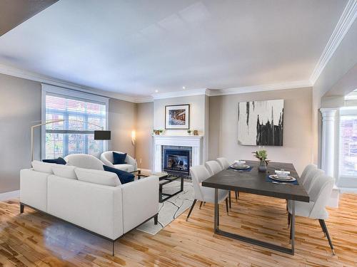 Salon - 432 Rue Des Alismas, Laval (Sainte-Dorothée), QC - Indoor Photo Showing Living Room With Fireplace