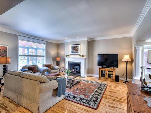 Salon - 432 Rue Des Alismas, Laval (Sainte-Dorothée), QC - Indoor Photo Showing Living Room With Fireplace