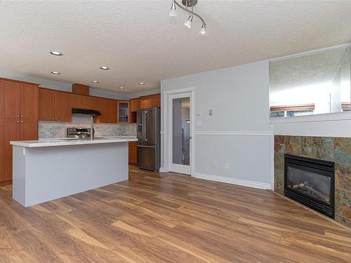 2158 Kingbird Dr, Langford, BC - Indoor Photo Showing Kitchen With Fireplace