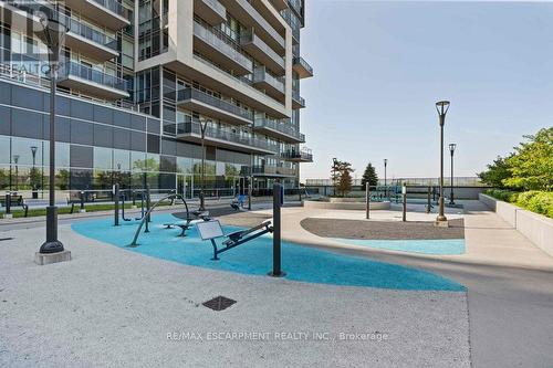 1008 - 2081 Fairview Street, Burlington, ON - Outdoor With In Ground Pool