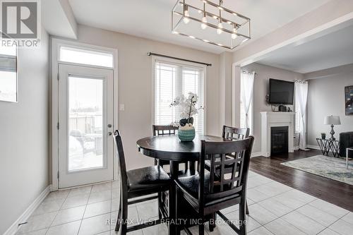 12 Pierce Place, New Tecumseth, ON - Indoor Photo Showing Dining Room With Fireplace