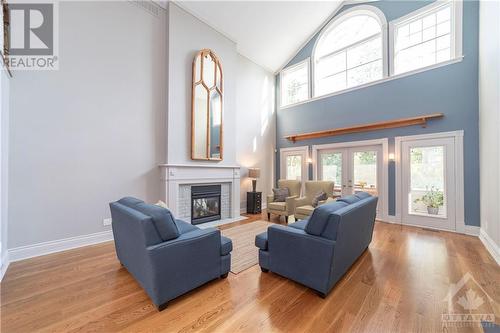 105 Wilbert Cox Drive, Ottawa, ON - Indoor Photo Showing Living Room With Fireplace