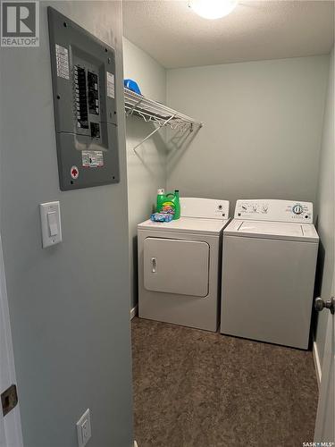 201 306 Perkins Street, Estevan, SK - Indoor Photo Showing Laundry Room